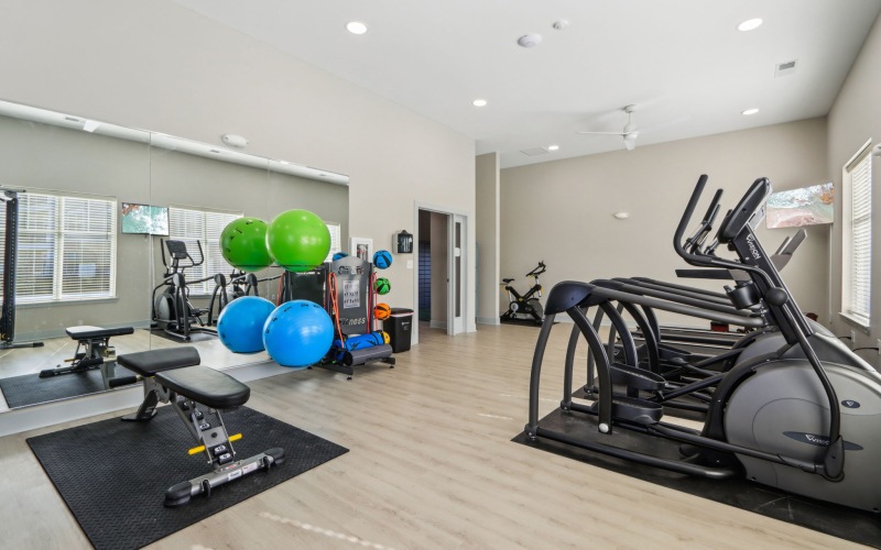 fitness room with workout equipment