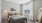 Styled apartment bedroom with floor lamp