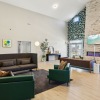 Styled apartment clubhouse with fireplace