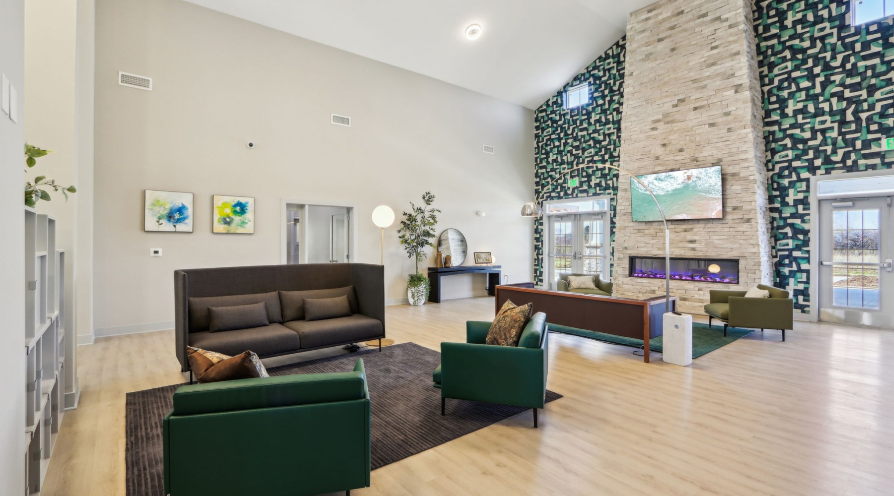 Styled apartment clubhouse with fireplace