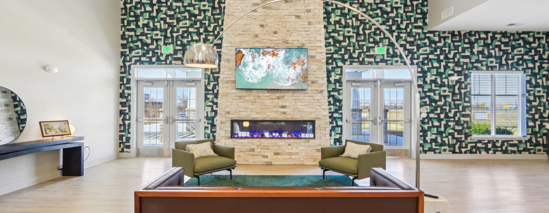 Apartment clubhouse with fireplace and lounge
